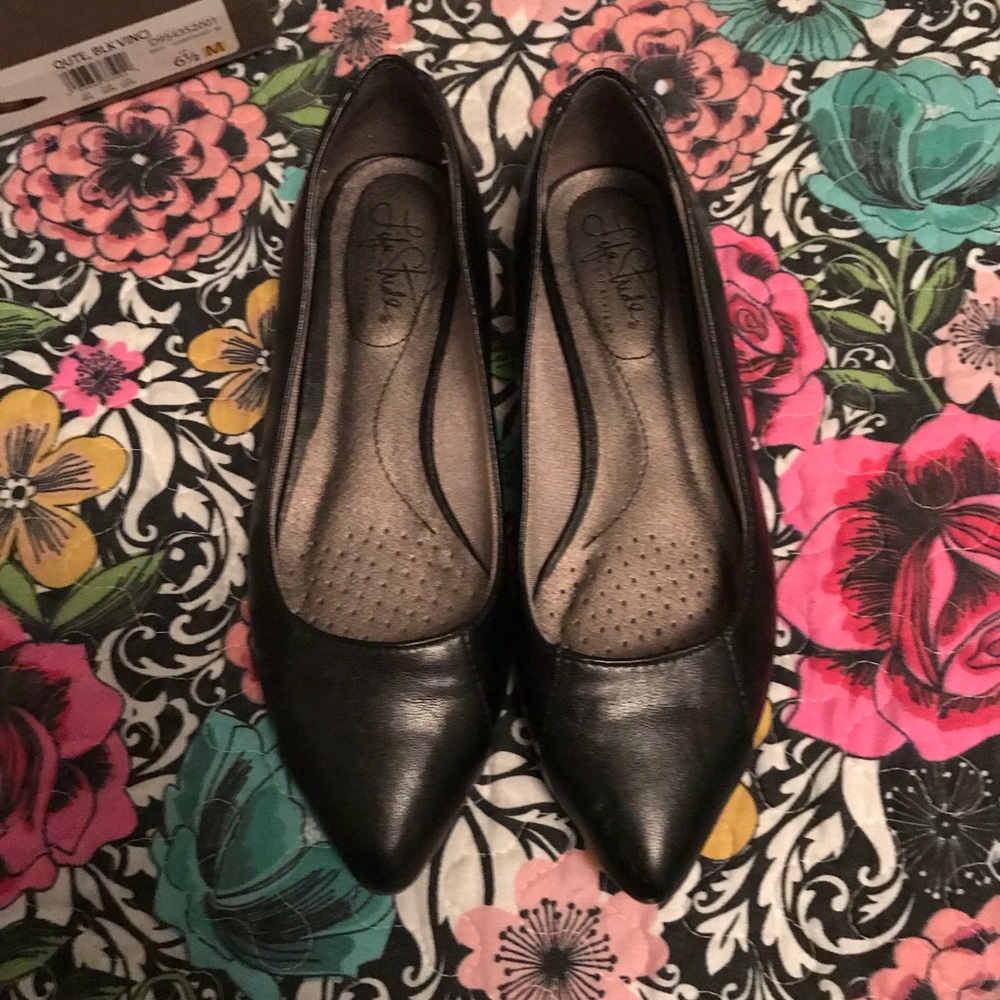 Black, pointed-toe flats by Life Stride